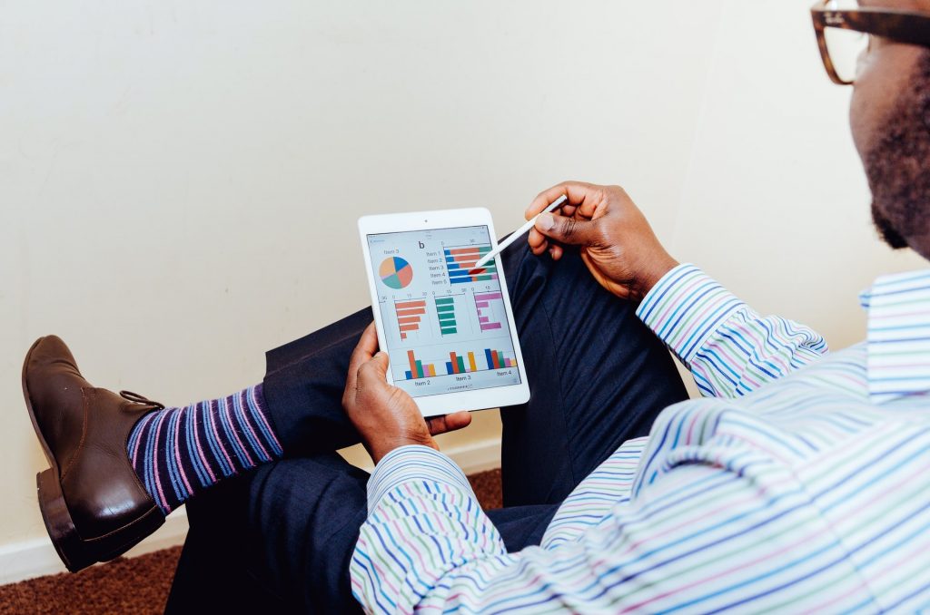 Human resource employee looking at people data of his company.